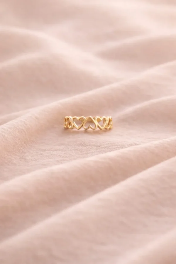 Anillo diseño corazones golfi dorado