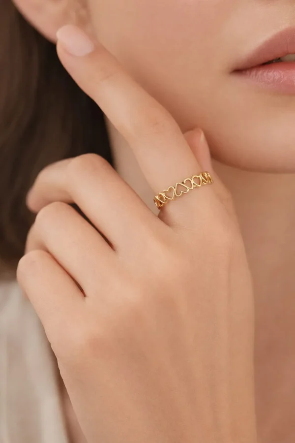 Anillo diseño corazones golfi dorado