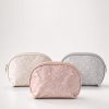 Cosmetiquera semi ovalada relieve numeros (rosa,gris,blanco perla)