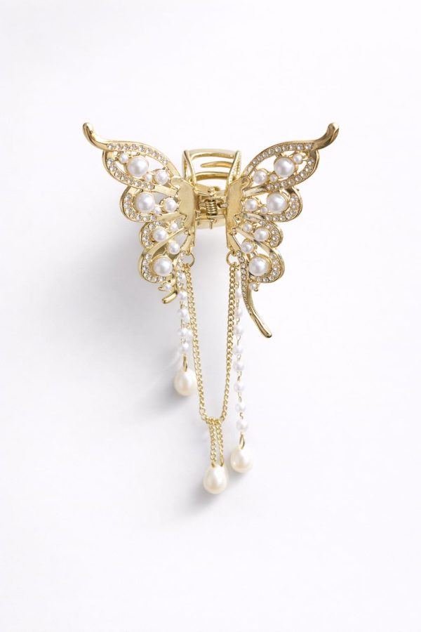 Vincha metalica diseño  mariposa con perlas