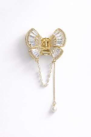 Vincha metálica mariposa pequeña perlas