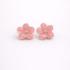 Arete flor rosado marmoleado bordes dorados