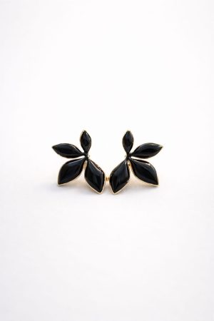 Arete flor negra con bordes dorados