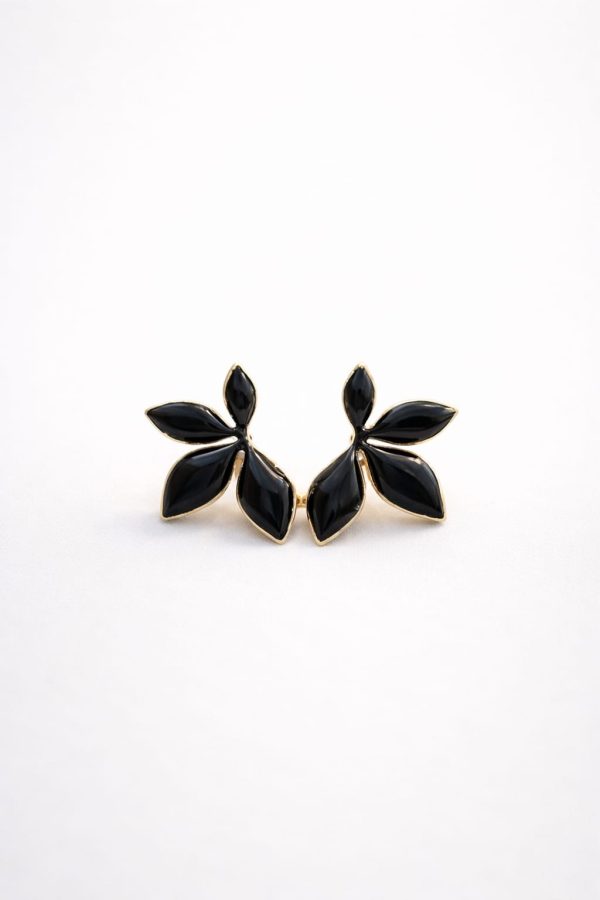 Arete flor negra con bordes dorados