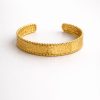 Pulsera diseño texturizado bordes dorado