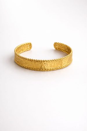 Pulsera diseño texturizado bordes dorado
