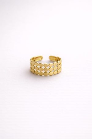 Anillo ancho con diseño de pequeños circulos