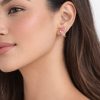 Arete mariposa relieve dorada (morado,celeste)