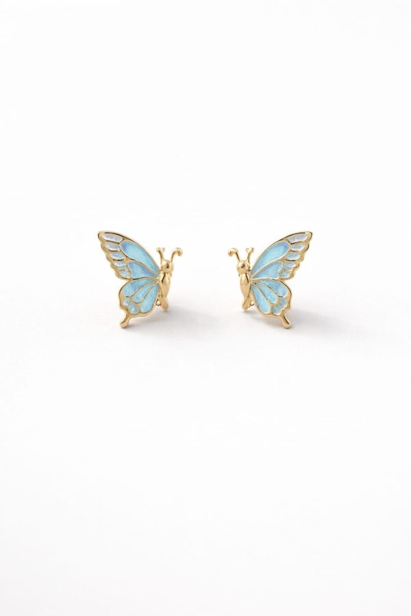 Arete mariposa relieve dorada (morado,celeste)