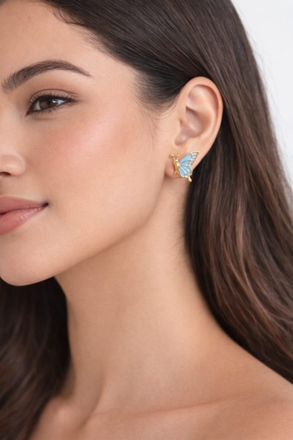 Arete mariposa relieve dorada (morado,celeste)