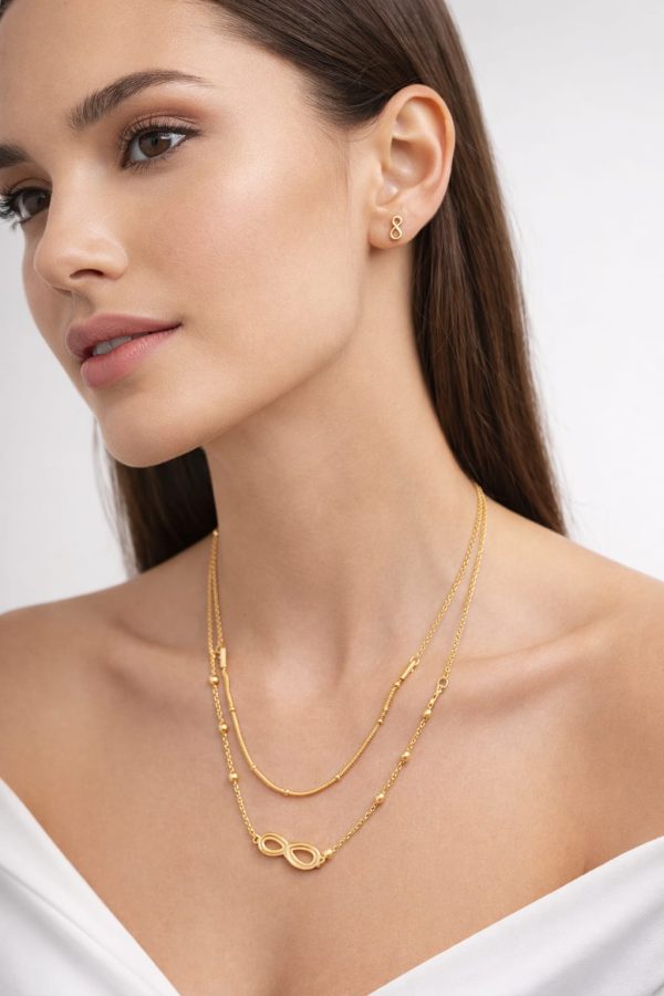 Juego cadena arete infinito dorado