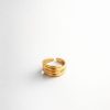 Anillo diseño líneas curvas golfi dorado