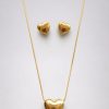 Juego cadena arete diseño corazon inflado dorado