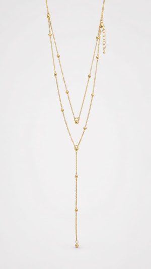 Juego cadena arete doble con delicadas esferas doradas