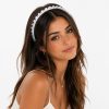 Diadema delgada con cristales entre grandes y pequeños (morado,azul,negro,azul,marron)