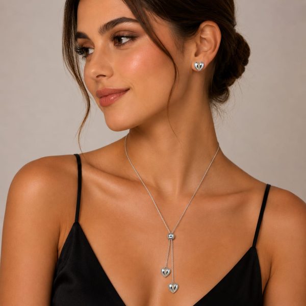 Juego cadena ajustable y arete diseño corazon plateado