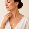 Juego cadena ajustable y arete doble circulo plateado