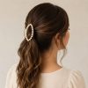 Vincha de cabello mediana ovalada con bordes de brillos
