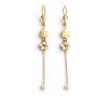 Arete largo floral con perlas y cadena colgante