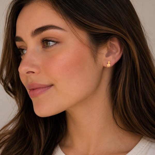 Aretes pequeños diseño patito dorado