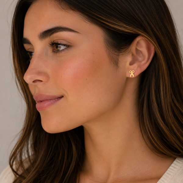 Aretes pequeños diseño tijera dorado