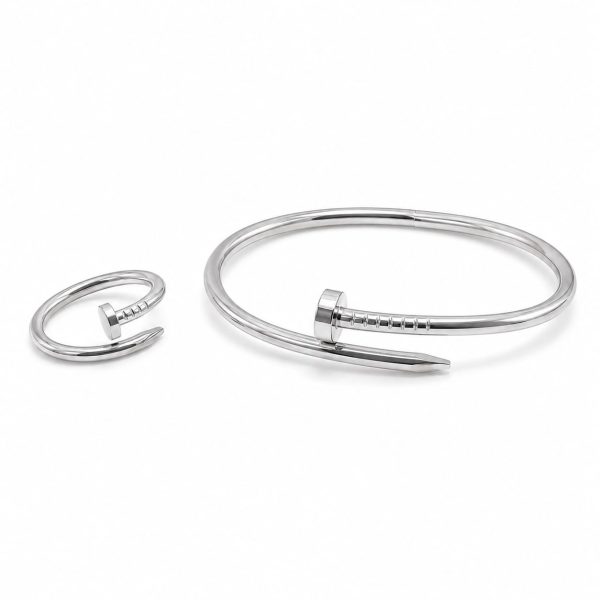 Juego pulsera y anillo clavo plateado
