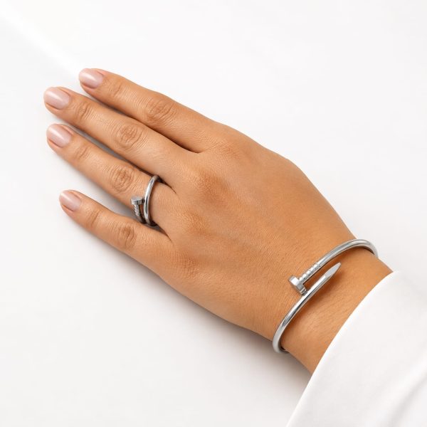 Juego pulsera y anillo clavo plateado