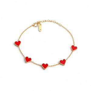 Pulsera corazones rojos dorada