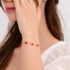Pulsera corazones rojos dorada